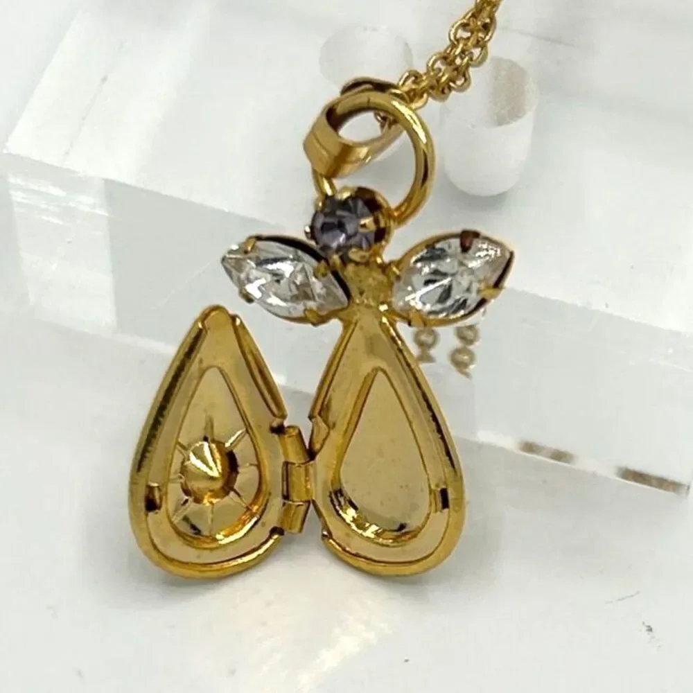 Vintage gold tone angel pendant locket birthstone necklace - purple rhinestone